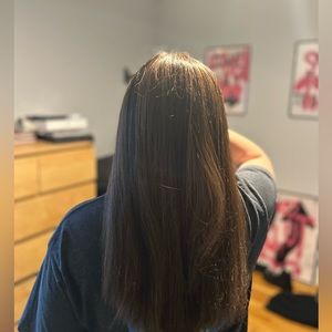 Half human half synthetic wig, long face framing layers in the front. Set part